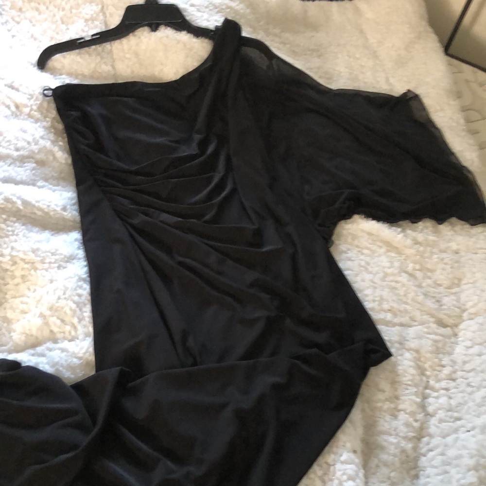 Full length one shoulder evening dress.